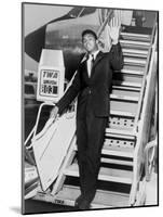 Muhammad Ali, Waves from the Steps of a TWA Airplane at JFK Airport, NYC, 1964-null-Mounted Photo