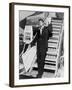 Muhammad Ali, Waves from the Steps of a TWA Airplane at JFK Airport, NYC, 1964-null-Framed Photo