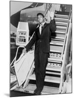 Muhammad Ali, Waves from the Steps of a TWA Airplane at JFK Airport, NYC, 1964-null-Mounted Photo
