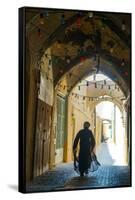 Mullah hurrying down typical vaulted alleyway, Yazd, Iran, Middle East-James Strachan-Framed Stretched Canvas