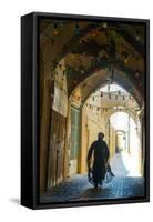 Mullah hurrying down typical vaulted alleyway, Yazd, Iran, Middle East-James Strachan-Framed Stretched Canvas