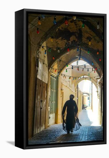 Mullah hurrying down typical vaulted alleyway, Yazd, Iran, Middle East-James Strachan-Framed Stretched Canvas