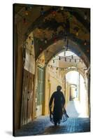 Mullah hurrying down typical vaulted alleyway, Yazd, Iran, Middle East-James Strachan-Stretched Canvas