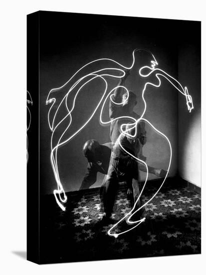 Multiple Exposure of Artist Pablo Picasso Using Flashlight to Make Light Drawing of a Figure-Gjon Mili-Stretched Canvas