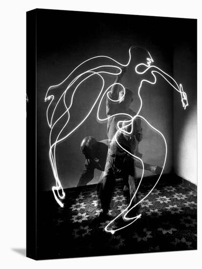 Multiple Exposure of Artist Pablo Picasso Using Flashlight to Make Light Drawing of a Figure-Gjon Mili-Stretched Canvas