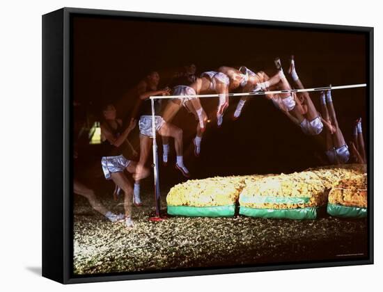 Multiple Exposure of Dick Fosbury in Action During High Jump at Summer Olympics-Michael Rougier-Framed Stretched Canvas