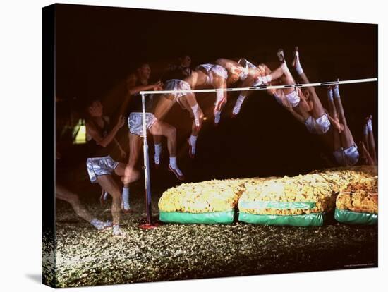 Multiple Exposure of Dick Fosbury in Action During High Jump at Summer Olympics-Michael Rougier-Stretched Canvas