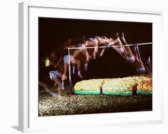 Multiple Exposure of Dick Fosbury in Action During High Jump at Summer Olympics-Michael Rougier-Framed Premium Photographic Print