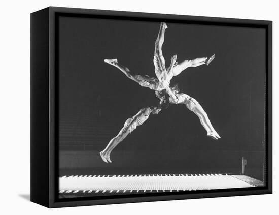 Multiple Exposure Shot of a Gymnast Jumping on a Trampoline-J^ R^ Eyerman-Framed Stretched Canvas