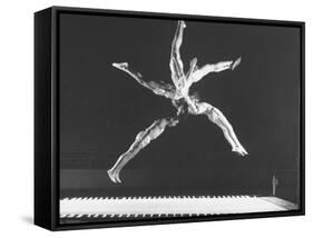 Multiple Exposure Shot of a Gymnast Jumping on a Trampoline-J^ R^ Eyerman-Framed Stretched Canvas