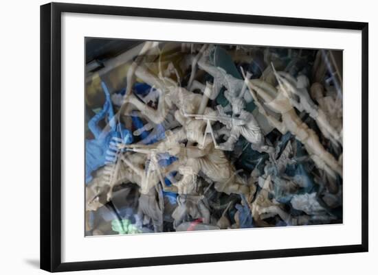 Multiple exposures of toy army men-null-Framed Photo