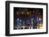 Multiple Fireworks Exploding High in the Sky over Modern Building in City.-tawanlubfah-Framed Photographic Print