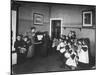 Music Lesson at a German School. One Teacher Plays the Piano-null-Mounted Art Print