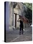 Musician Carrying Double Bass Along Cobbled Street to Plaza Mayor, Trinidad, Cuba-Lee Frost-Stretched Canvas