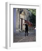 Musician Carrying Double Bass Along Cobbled Street to Plaza Mayor, Trinidad, Cuba-Lee Frost-Framed Photographic Print