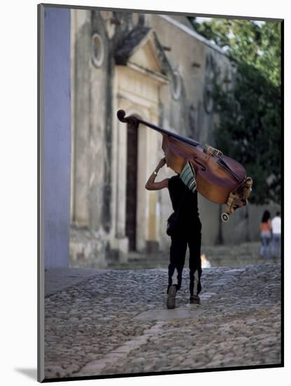 Musician Carrying Double Bass Along Cobbled Street to Plaza Mayor, Trinidad, Cuba-Lee Frost-Mounted Photographic Print