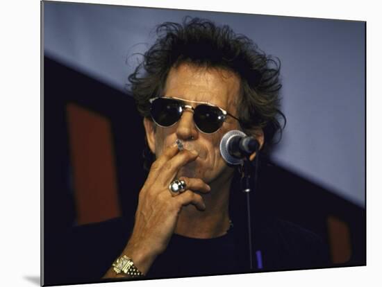 Musician Keith Richards Smoking Cigarette-null-Mounted Premium Photographic Print