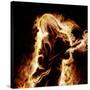 Musician With An Electronic Guitar Enveloped In Flames On A Black Background-Sergey Nivens-Stretched Canvas