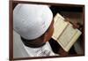 Muslim boy learning Quran at Islamic school, with Kufi hat-Godong-Framed Photographic Print