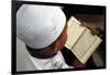 Muslim boy learning Quran at Islamic school, with Kufi hat-Godong-Framed Photographic Print