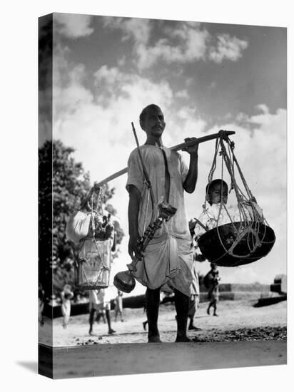 Muslim Man carrying his son and hookah in Convoy to West Punjab to Escape Anti Muslim Sikhs-Margaret Bourke-White-Stretched Canvas