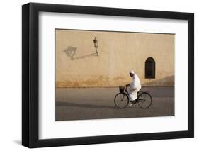 Muslim Man Dressed in White on Bicycle in Old Quarter, Medina, Marrakech, Morocco-Stephen Studd-Framed Photographic Print