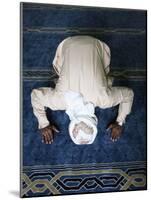 Muslim Man Praying, Dubai, United Arab Emirates, Middle East-null-Mounted Photographic Print