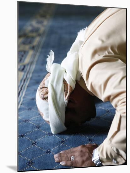 Muslim Man Praying, Dubai, United Arab Emirates, Middle East-null-Mounted Photographic Print