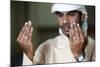 Muslim man praying, Dubai, United Arab Emirates-Godong-Mounted Photographic Print