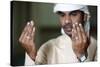 Muslim man praying, Dubai, United Arab Emirates-Godong-Stretched Canvas