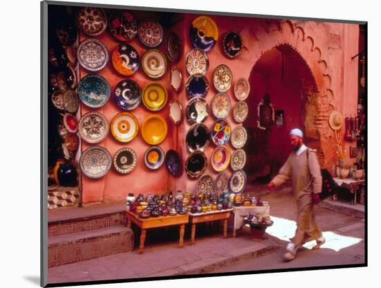 Muslim Man Walks by Wall of Moroccan Pottery, Marrakech, Morocco-John & Lisa Merrill-Mounted Photographic Print