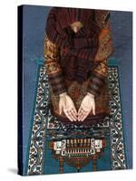 Muslim Woman Kneeling on Prayer Mat Saying Prayers, Jordan, Middle East-null-Stretched Canvas