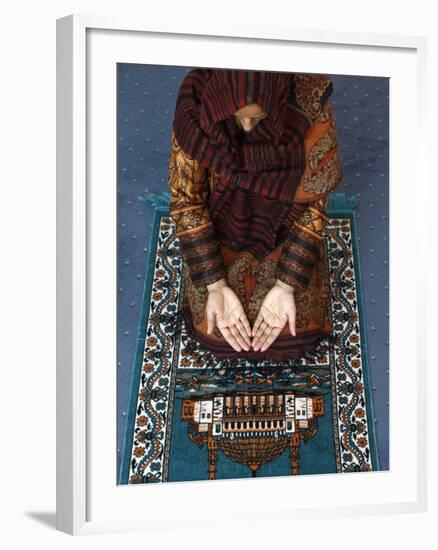 Muslim Woman Kneeling on Prayer Mat Saying Prayers, Jordan, Middle East-null-Framed Photographic Print