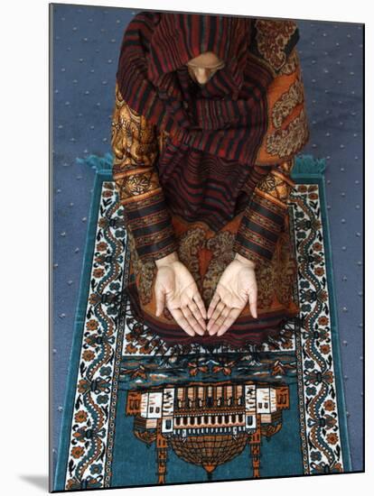 Muslim Woman Kneeling on Prayer Mat Saying Prayers, Jordan, Middle East-null-Mounted Photographic Print