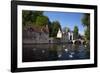 Mute swans (Cygnus olor), at the Minnewater Lake and Begijnhof Bridge with entrance to Beguinage, B-Peter Barritt-Framed Photographic Print