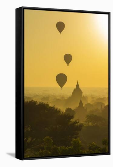 Myanmar. Bagan. Hot Air Balloons Rising over the Temples of Bagan-Inger Hogstrom-Framed Stretched Canvas