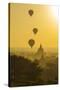 Myanmar. Bagan. Hot Air Balloons Rising over the Temples of Bagan-Inger Hogstrom-Stretched Canvas