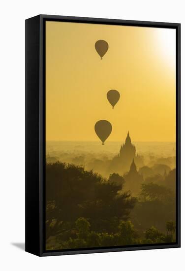 Myanmar. Bagan. Hot Air Balloons Rising over the Temples of Bagan-Inger Hogstrom-Framed Stretched Canvas