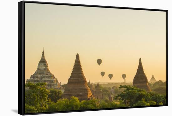 Myanmar. Bagan. Hot Air Balloons Rising over the Temples of Bagan-Inger Hogstrom-Framed Stretched Canvas