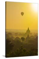 Myanmar. Bagan. Hot Air Balloons Rising over the Temples of Bagan-Inger Hogstrom-Stretched Canvas