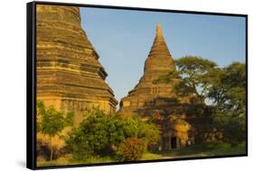 Myanmar. Bagan. Red Brick Temple Glows in the Late Afternoon Light-Inger Hogstrom-Framed Stretched Canvas