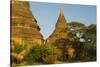 Myanmar. Bagan. Red Brick Temple Glows in the Late Afternoon Light-Inger Hogstrom-Stretched Canvas