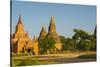 Myanmar. Bagan. Red Brick Temple Glows in the Late Afternoon Light-Inger Hogstrom-Stretched Canvas