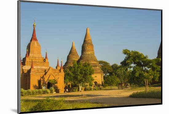 Myanmar. Bagan. Red Brick Temple Glows in the Late Afternoon Light-Inger Hogstrom-Mounted Photographic Print