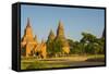 Myanmar. Bagan. Red Brick Temple Glows in the Late Afternoon Light-Inger Hogstrom-Framed Stretched Canvas