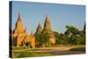 Myanmar. Bagan. Red Brick Temple Glows in the Late Afternoon Light-Inger Hogstrom-Stretched Canvas