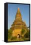 Myanmar. Bagan. Red Brick Temple Glows in the Late Afternoon Light-Inger Hogstrom-Framed Stretched Canvas