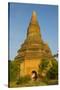 Myanmar. Bagan. Red Brick Temple Glows in the Late Afternoon Light-Inger Hogstrom-Stretched Canvas