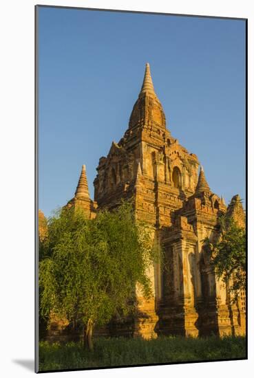 Myanmar. Bagan. Red Brick Temple Glows in the Late Afternoon Light-Inger Hogstrom-Mounted Photographic Print