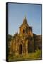 Myanmar. Bagan. Red Brick Temple Glows in the Late Afternoon Light-Inger Hogstrom-Framed Stretched Canvas